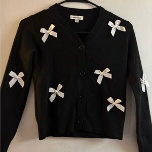 Girls size 10  Black Cardigan with White Bow Details